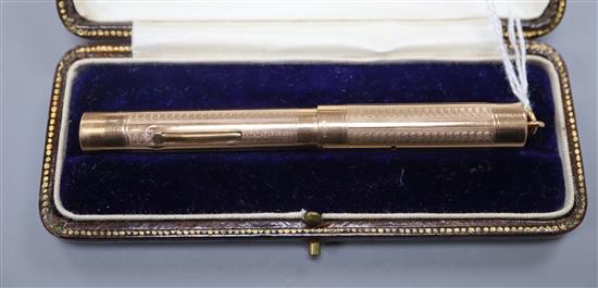 A 9ct gold cased Swan Mabie, Todd & Co Ltd fountain pen, in case.